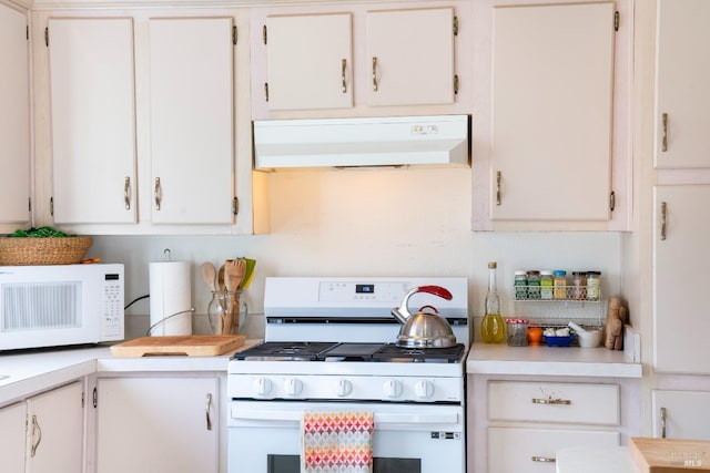 kitchen with light countertops, white cabinets, white appliances, and range hood