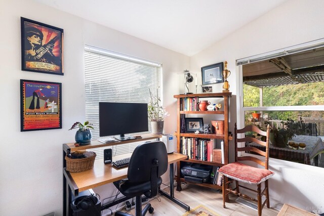 office area featuring light hardwood / wood-style flooring