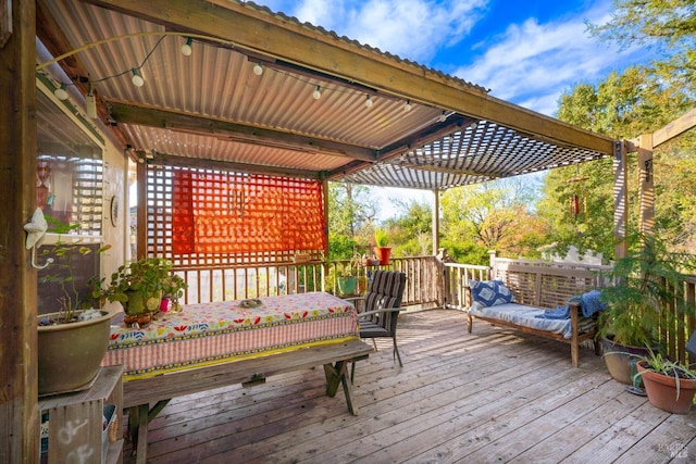 wooden terrace with a pergola