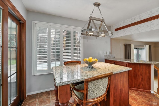 dining room featuring plenty of natural light