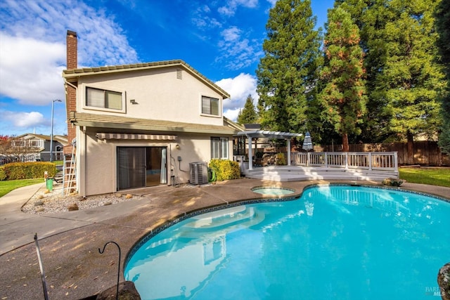 view of swimming pool featuring cooling unit, a patio area, a pergola, and an in ground hot tub