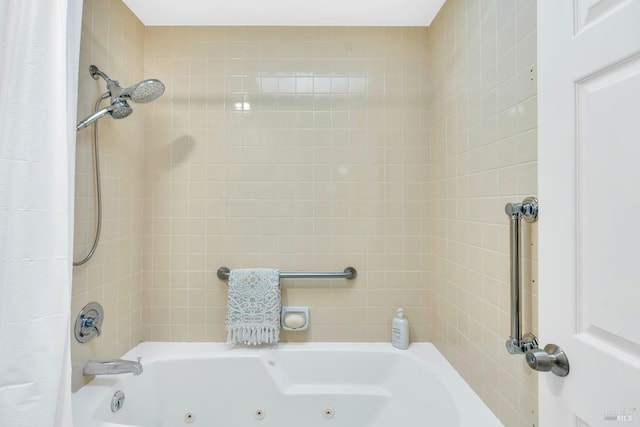 full bath featuring a combined bath / shower with jetted tub