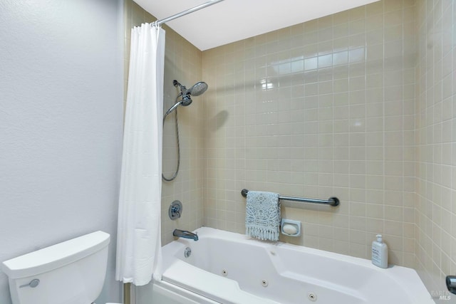 bathroom with toilet and a combined bath / shower with jetted tub