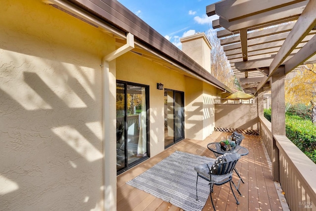wooden terrace featuring a pergola