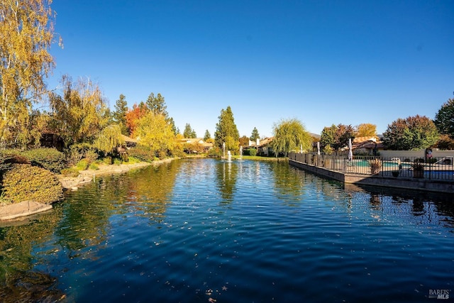 property view of water with fence