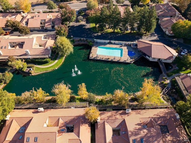 birds eye view of property with a residential view