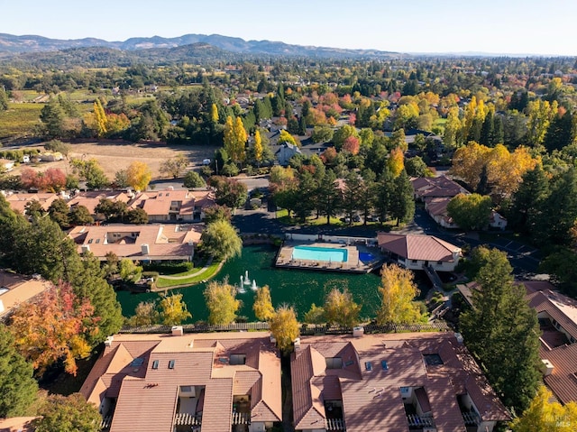 drone / aerial view featuring a mountain view and a residential view