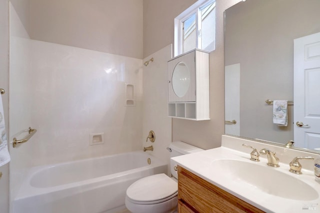 full bathroom featuring vanity, toilet, and tub / shower combination