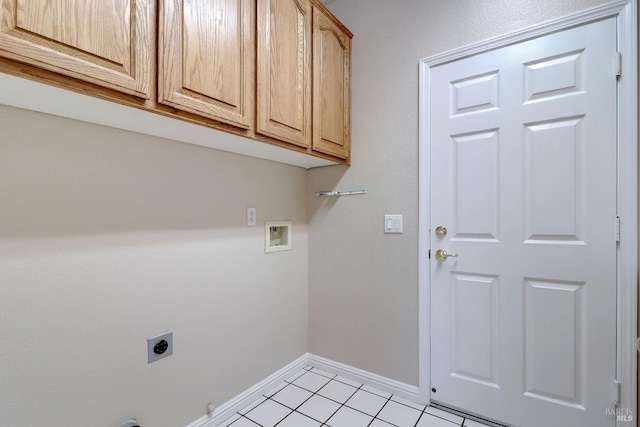 laundry area with cabinets, hookup for a gas dryer, hookup for a washing machine, light tile patterned floors, and hookup for an electric dryer