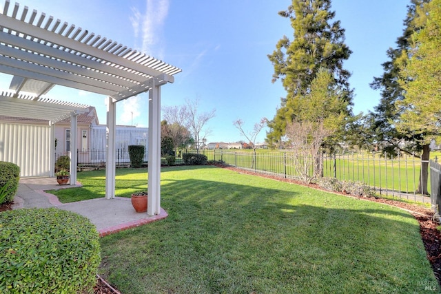 view of yard with a pergola and a patio