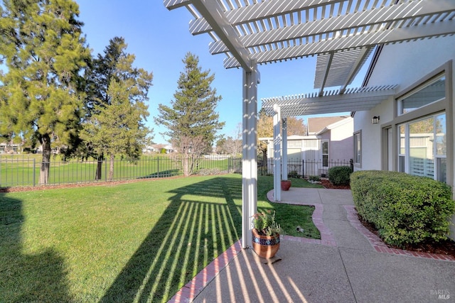 view of yard with a pergola and a patio area