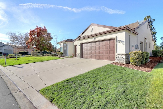 ranch-style house with a front yard and a garage