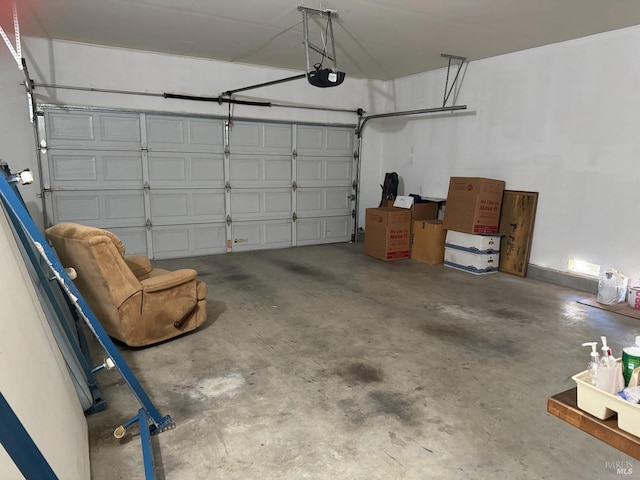 garage featuring a garage door opener