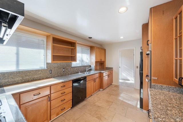 kitchen featuring sink, decorative backsplash, light tile patterned floors, and dishwasher