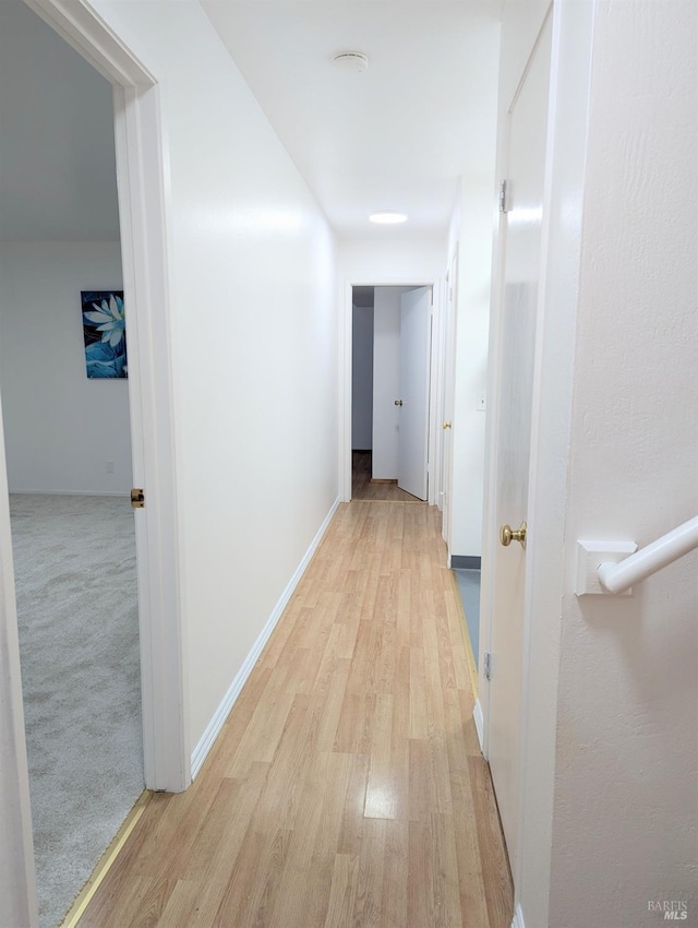 hall featuring light hardwood / wood-style flooring