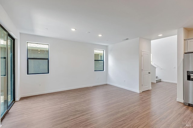 9005 Camino Colegio Rd, Rohnert Park, CA 94928 - spare room featuring wood finished floors, baseboards, and recessed lighting