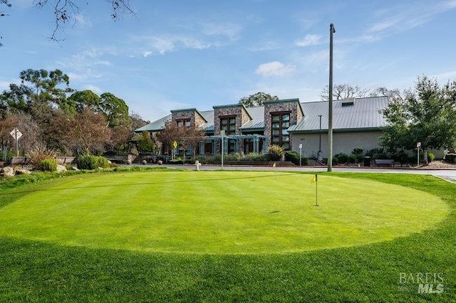 3473 Tice Creek Dr Unit 1, Walnut Creek, CA 94595 - surrounding community featuring a putting green and a yard