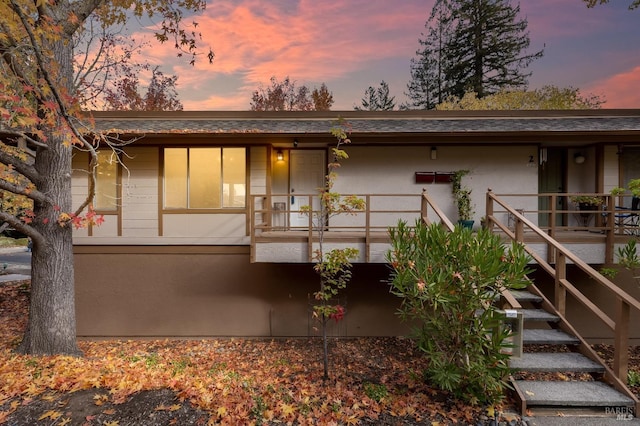 3473 Tice Creek Dr Unit 1, Walnut Creek, CA 94595 - rear view of house with stairway and covered porch