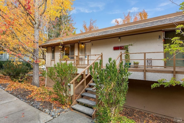3473 Tice Creek Dr Unit 1, Walnut Creek, CA 94595 - view of front of home with a porch, stucco siding, and stairs
