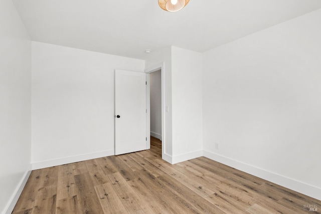 unfurnished room featuring light hardwood / wood-style flooring