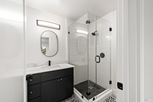 bathroom featuring vanity and walk in shower