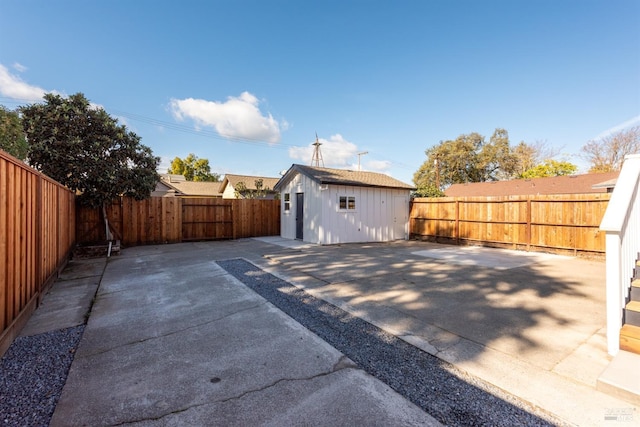 exterior space with a shed