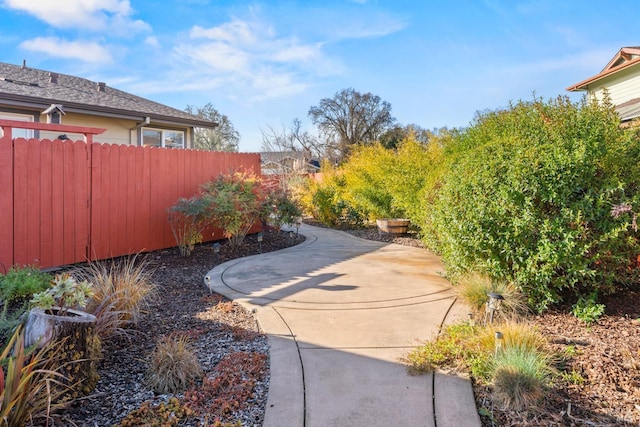 view of yard featuring a patio area and fence