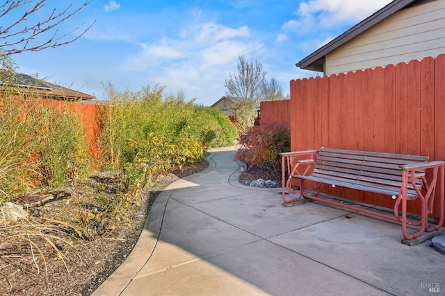 view of patio / terrace featuring fence