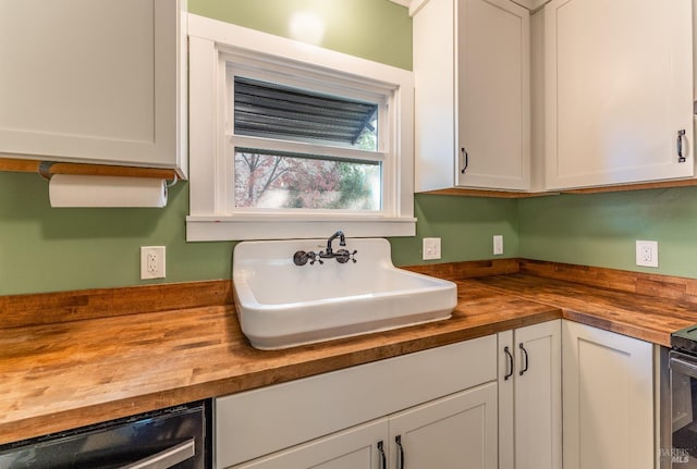 interior space featuring sink and beverage cooler