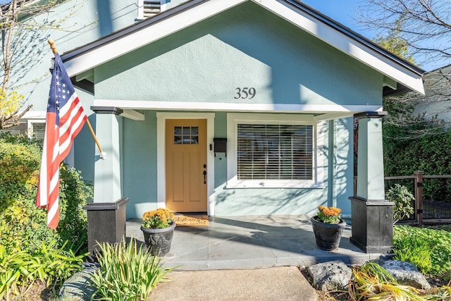 doorway to property with a porch