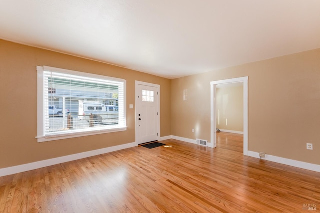 entrance foyer with light wood-type flooring