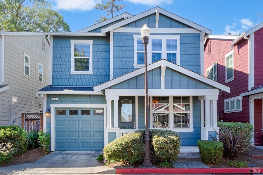 craftsman inspired home with a garage