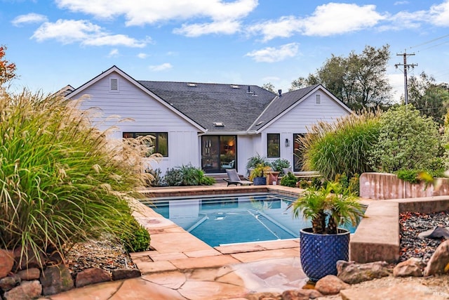 pool featuring a patio area