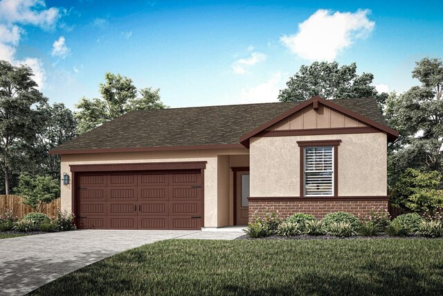 view of front facade with a front lawn and a garage