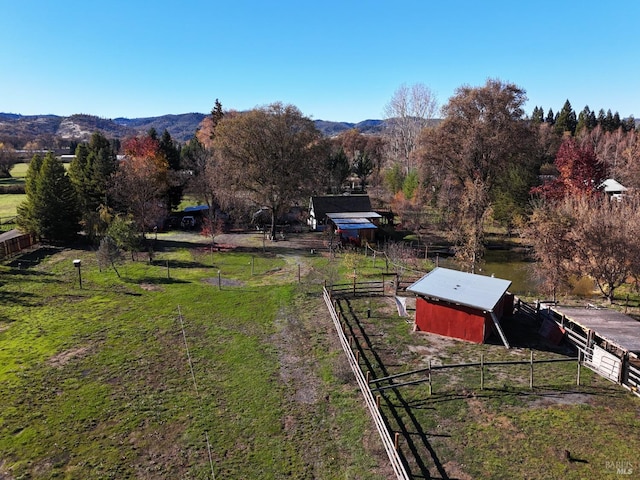 aerial view with a mountain view and a rural view