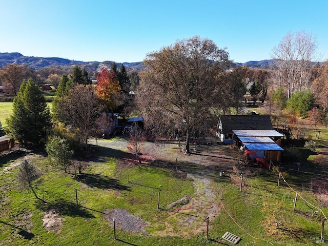 aerial view featuring a mountain view and a rural view