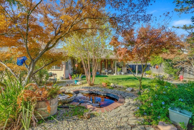 view of yard featuring fence