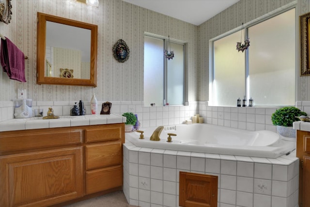 full bathroom with wallpapered walls and a garden tub