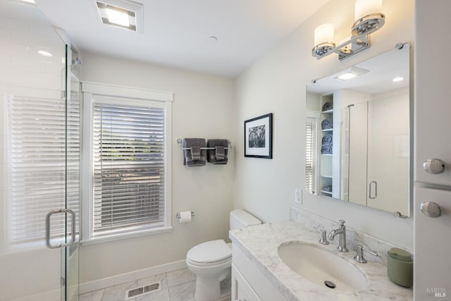 bathroom featuring toilet, tile patterned flooring, vanity, and walk in shower