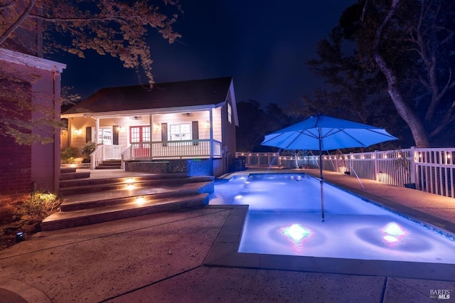 exterior space featuring a patio area and a hot tub