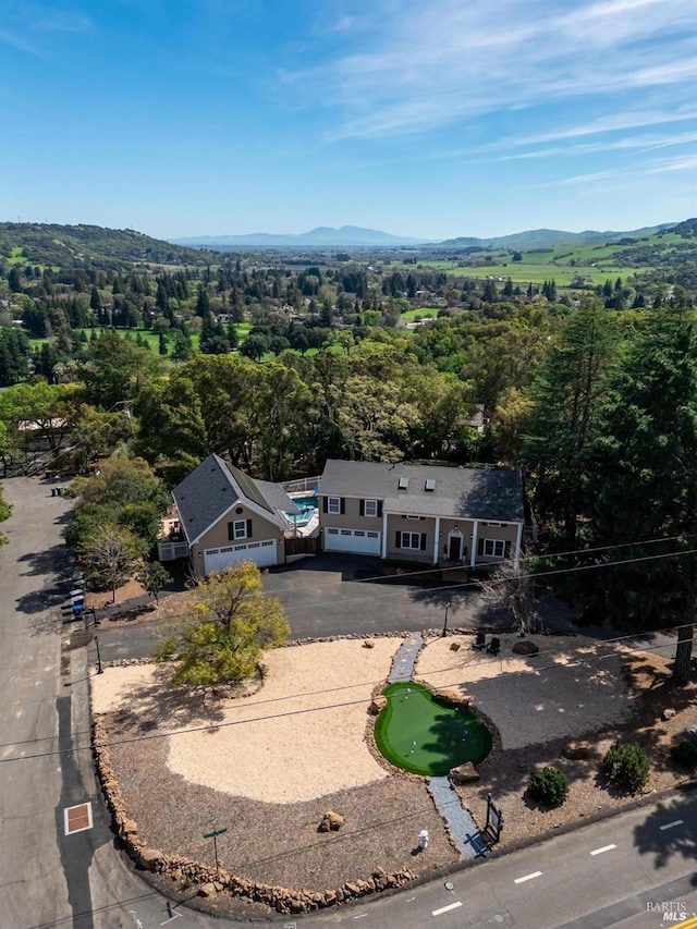 drone / aerial view featuring a mountain view