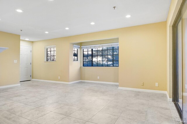 empty room with an inviting chandelier