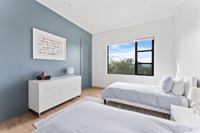 bedroom featuring light hardwood / wood-style flooring