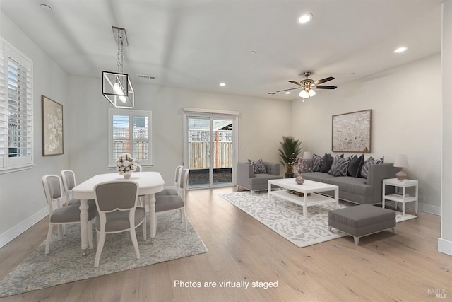 interior space with baseboards, visible vents, ceiling fan, light wood-style floors, and recessed lighting