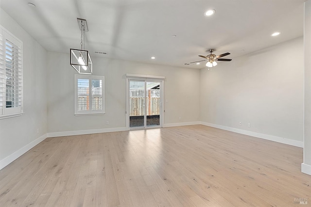 unfurnished room with visible vents, baseboards, a ceiling fan, light wood-style flooring, and recessed lighting