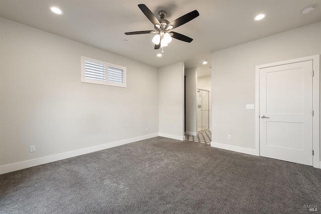 spare room with recessed lighting, dark carpet, baseboards, and ceiling fan