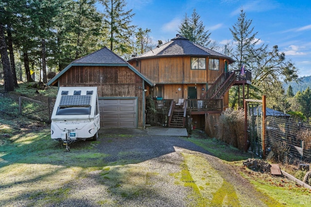 view of front of home with a garage