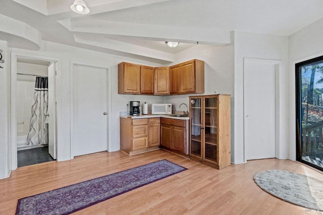 kitchen featuring sink and light hardwood / wood-style floors