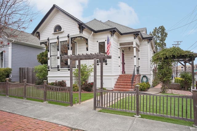 view of front of home with a front lawn