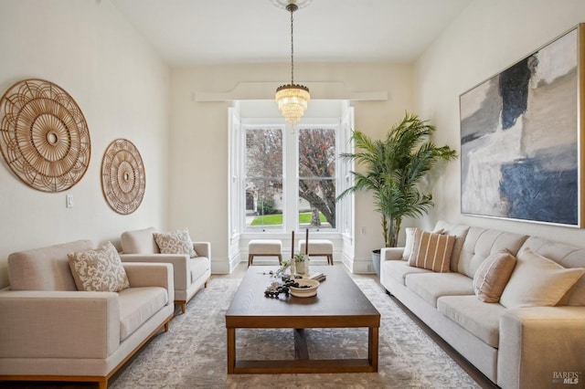 living room featuring an inviting chandelier